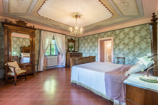 Een slaapkamer bij Palazzo Rosadi