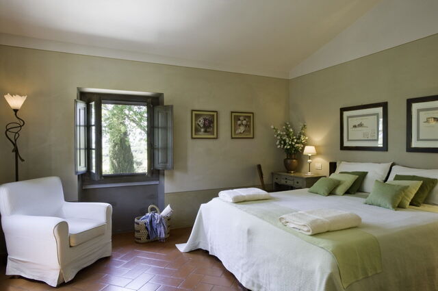 Een slaapkamer in Villa Il Colto