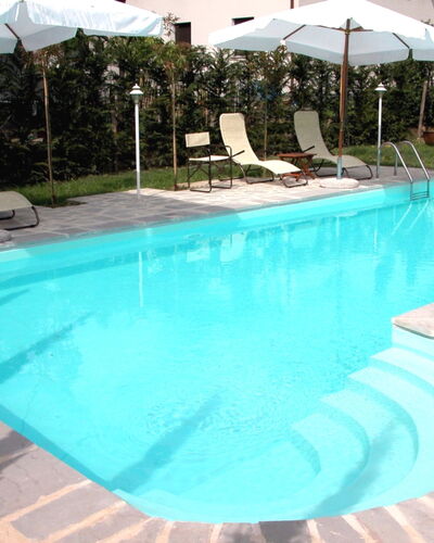 Monastery Guest House: Water, Fabriek, Zwembad, Gebouw, Azure, Schaduw, Rechthoek, Buitenmeubels, Boom, Samengesteld Materiaal