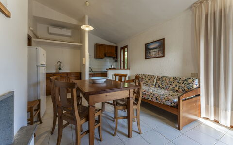 Giannella Apartment - Orbetello, Toscana: Meubilair, Tafel, Azure, Hout, Stoel, Flooring, Verdieping, Gebouw, Hardwood, Gordijn