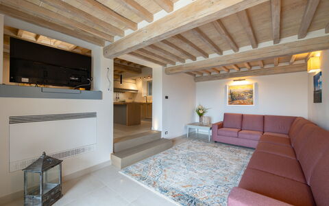 Villa Luana: Eigendom, Bankstel, Comfort, Woonkamer, Architectuur, Hout, Interieur Ontwerp, Flooring, Verdieping, Muur