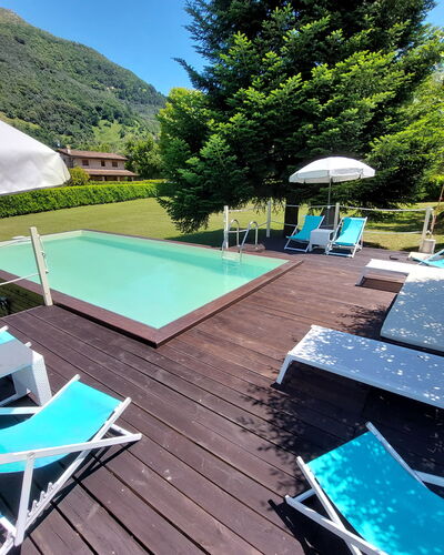 Villa L'antico Casale: Eigendom, Meubilair, Water, Paraplu, Zwembad, Lucht, Groen, Blauw, Azure, Schaduw