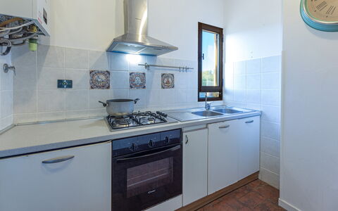 La Vigna 4: Keuken, Major Appliance, Toestel Van De Keuken, Countertop, Fornuis, Gasfornuis, Gootsteen, Fornuis, Flooring, Cooktop